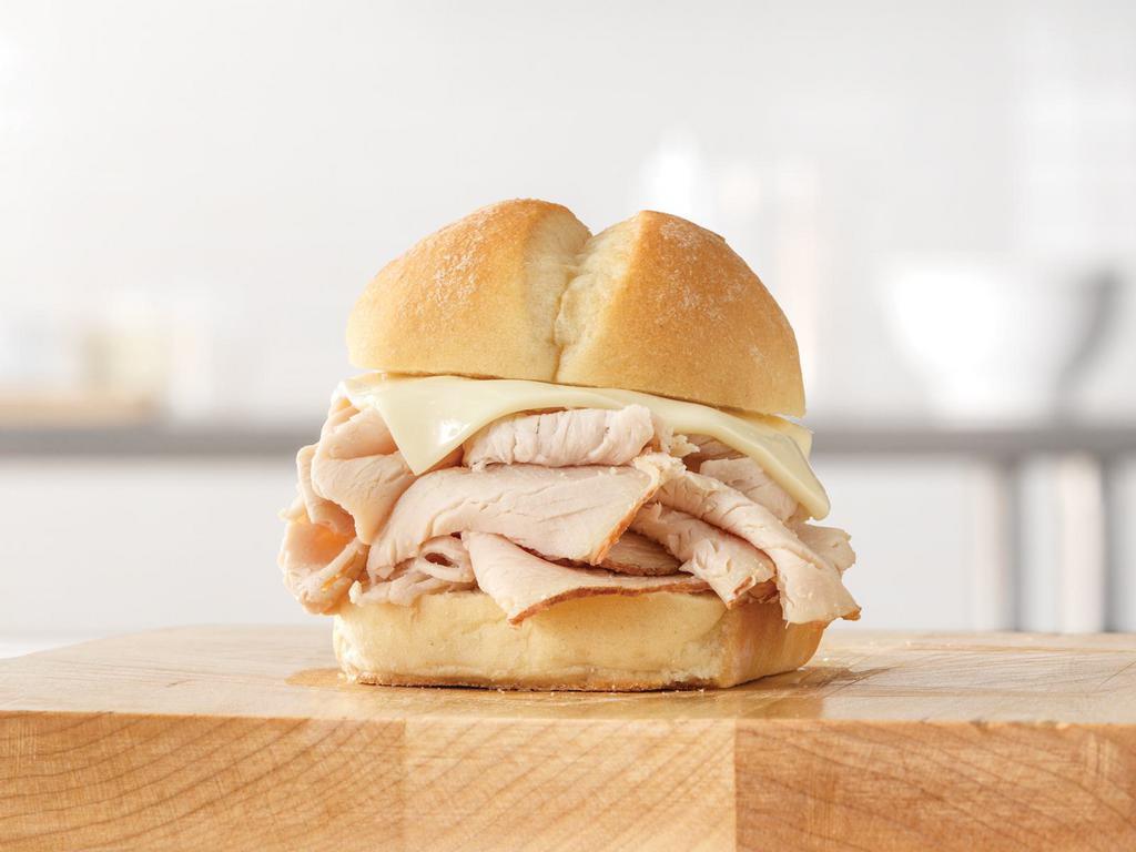 Turkey 'n Cheese Slider · Thinly sliced turkey and melted cheese on a soft slider style bun. Visit arbys.com for nutritional and allergen information.