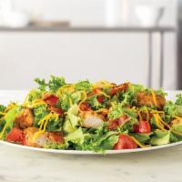 Crispy Chicken Farmhouse Salad · Crispy chicken and diced pepper bacon on a bed of chopped fresh lettuce with diced tomatoes ...