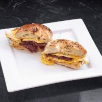 Eggs with Meat and Cheese sandwich · Comes standard with American cheese unless specified in notes for replacement 