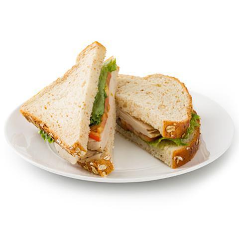 GoSmart Turkey Sandwich · Enjoy four hearty slices of oven roasted turkey breast, lettuce and fresh tomatoes on whole wheat bread.