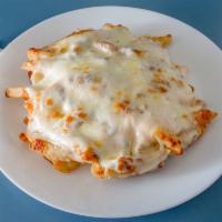 Royal Mega Fries · Fries smothered with melted cheddar and provolone topped with ranch dressing, mozzarella che...