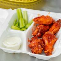 8 Piece Wing  · 1 sauce flavor, celery sticks and 1 ranch or blue cheese dipping. 