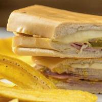 Cuban Sandwich · Ham, pork, Swiss cheese, pickles and mustard on Cuban bread.