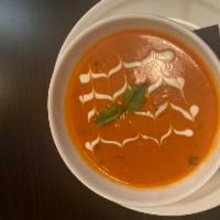 Homemade Roasted Tomato Basil Soup · Handmade warm roasted soup made with Tomato, Basil, Onion and Garlic with a touch of cream.