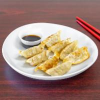8 Dumplings  · Steamed or fried  pork dumplings.