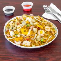 Golden Star Super Special Fried Rice · Has chicken, ham, shrimp, jumbo shrimp, crabmeat, pork, eggs, onions, scallions and bean spr...