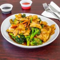 Chicken with Broccoli · Chicken with broccoli, carrots, and onions in sauce.