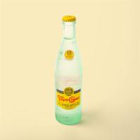 Topo Chico Mineral Water · 12 oz glass bottle of sparkling mineral water. Bottled at the source in Monterrey, Mexico si...