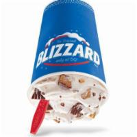 Reese's Peanut Butter Cup Blizzard® Treat · 
REESE'S Peanut Butter Cups blended with creamy DQ vanilla soft serve to BLIZZARD perfection.