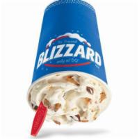 Butterfinger Blizzard Treat · Butterfinger candy pieces blended with creamy Dairy Queen vanilla soft serve to blizzard per...