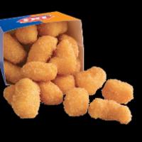 Cheese Curds · Poppable pieces of cheese, battered and fried until warm, melty, and crisp.