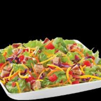 Rotisserie Bite Salad · Served with your choice of Marzetti® dressing and topped with Rotisserie Bite chicken, chopp...