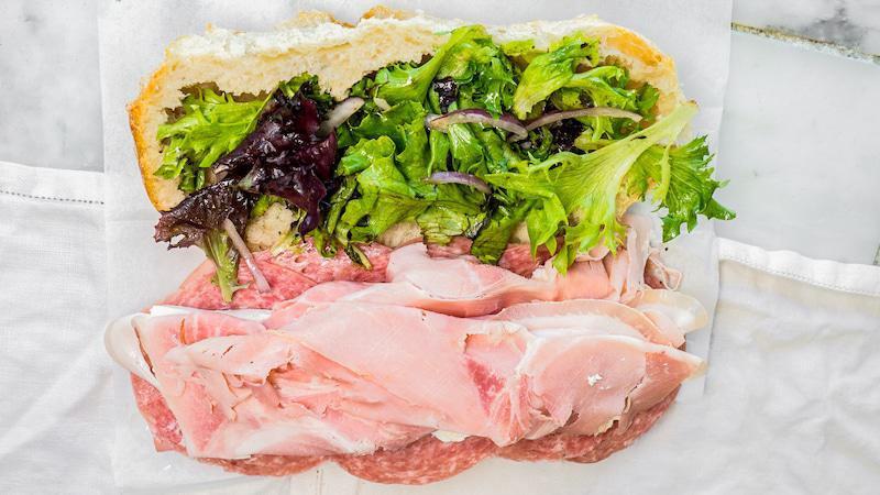 Italian Sandwich · Ham, genoa salami, mortadella, fresh mozzarella, lettuce, onion.