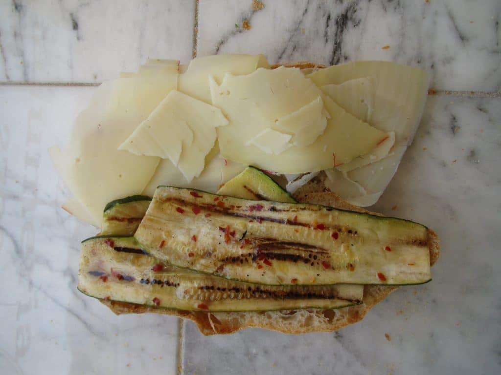 Provolone Sandwich · Auricchio sharp provolone, house roasted zucchini, pepperoncino, extra virgin olive oil.