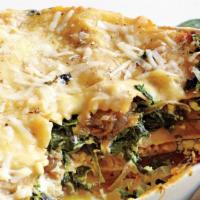 Spinach Lasagna · Per lb. San Marzano tomato sauce, house-made pasta, fresh mozzarella, house-made bechamel sa...