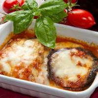 Eggplant Parmiggiana · One pound feeds one to two people.  This dish is assembled fresh daily and is sold UNBAKED. ...