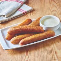Breadsticks with Alfredo Sauce · Five golden brown signature breadsticks brushed with garlic and parsley butter. Served with ...