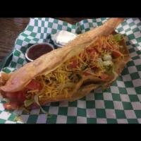 Giant Deep-Fried Taco · Our famous, one and only 12-inch-deep fried taco, with roasted corn salsa. Served to you for...