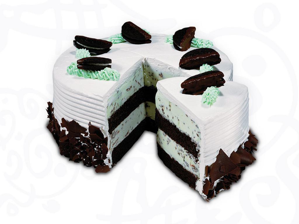 Mint Chip Cake · Layers of moist devil's food cake and mint ice cream with chocolate shavings wrapped in fluffy white frosting.