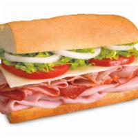 Blimpie Best® Sub  · Slow-cured ham, salami, capicola, prosciuttini and provolone made the BLIMPIE® WAY with toma...