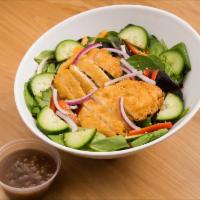 Sesame Ginger Salad · Spring mix, onions, red bell peppers, cucumbers topped with a sesame ginger dressing.