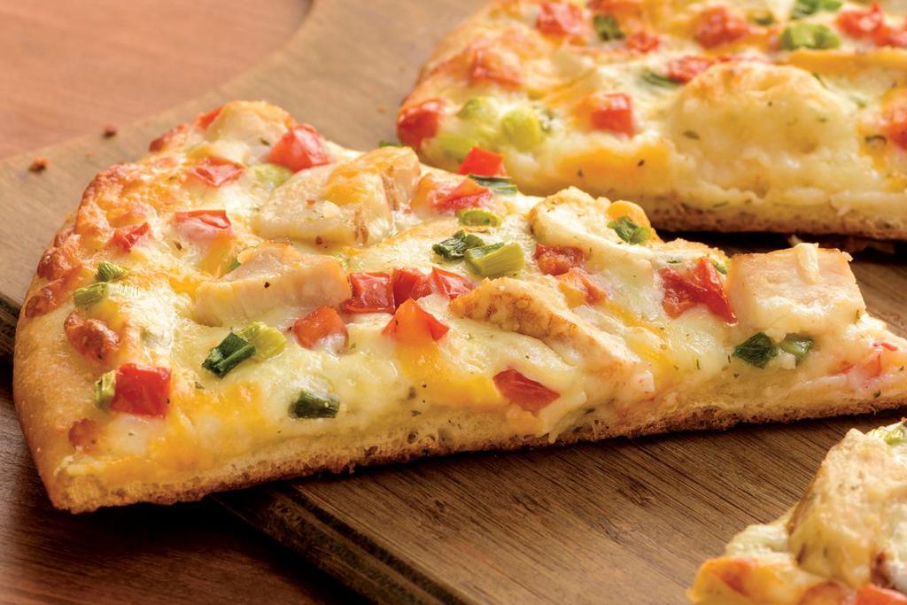 Chicken Garlic Pizza (Baking Required) · Grilled Chicken, Roma Tomatoes, Green Onions, Whole-Milk
Mozzarella, Mild Cheddar, and Herb & Cheese Blend, topped with Creamy Garlic Sauce on Our Original Crust