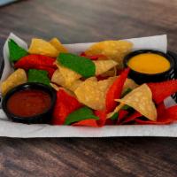 Chips, Salsa, & Queso · Made-to-order tortilla chips, mild salsa, and Queso