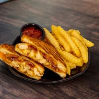 Grandma's Grilled Cheese · Grilled Chicken and Bacon between two slices of melted Cheddar Cheese and served on artisan ...