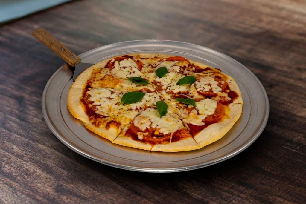 Margherita Pizza · Thin Sliced Tomato, Mozzarella, & Basil
