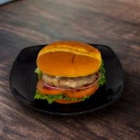Angus Muenster Burger · Our House Burger is Red Steer Farms Kansas Angus Beef, Muenster Cheese, Lettuce, Tomato, Oni...