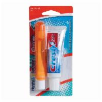 Crest Toothpaste & Tooth Brush  · 0.85 oz.