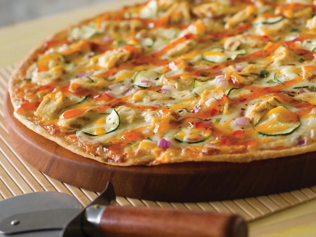 Thai Chicken Pizza (Baking Required) · Chicken, Zucchini, Mixed Onions, Crushed Red Peppers, Sweet Chili Sauce, Artisan Thin Crust