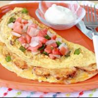 Chicken Fajitas Omelet · Grilled chicken, bell peppers, and onions, pepper jack cheese topped with salsa.
