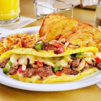 Steak Omelette · Chopped sirloin steak, bell peppers and onions, mushrooms, and swiss cheese.