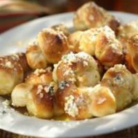 Mini Garlic Knots · Can add cheese for an additional charge.