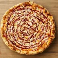 BBQ Chicken Pizza · A Southern pizza drizzled with BBQ sauce, red onions, and grilled chicken.