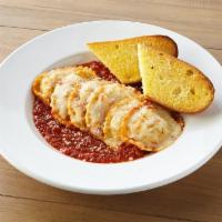 Baked Cheese Ravioli Dinner · Cheese stuffed ravioli baked in our marinara sauce and topped with mozzarella.