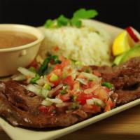 Carne Asada · Grilled steak. Served with rice, beans, salad, and 2 handmade tortillas.