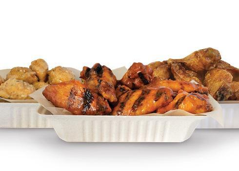 50 Wings · 50 Pit-Smoked Bone-In or traditional Boneless wings with up to 4 sauces *Dips & Veggie Sticks not Included*