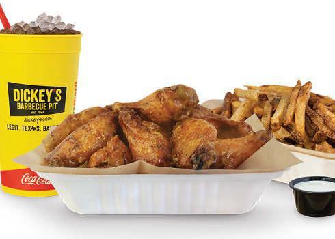 10 Piece Wing Combo · Pit-Smoked Bone-In or Traditional Boneless Wings with choice of up to 2 sauces, hand-cut fries, veggie sticks, 1 dip and a Big Yellow Cup