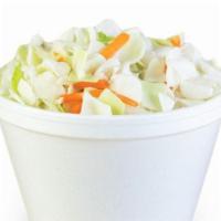 Coleslaw · Finely diced cabbage and carrots, seasoned with a tangy and sweet coleslaw dressing.