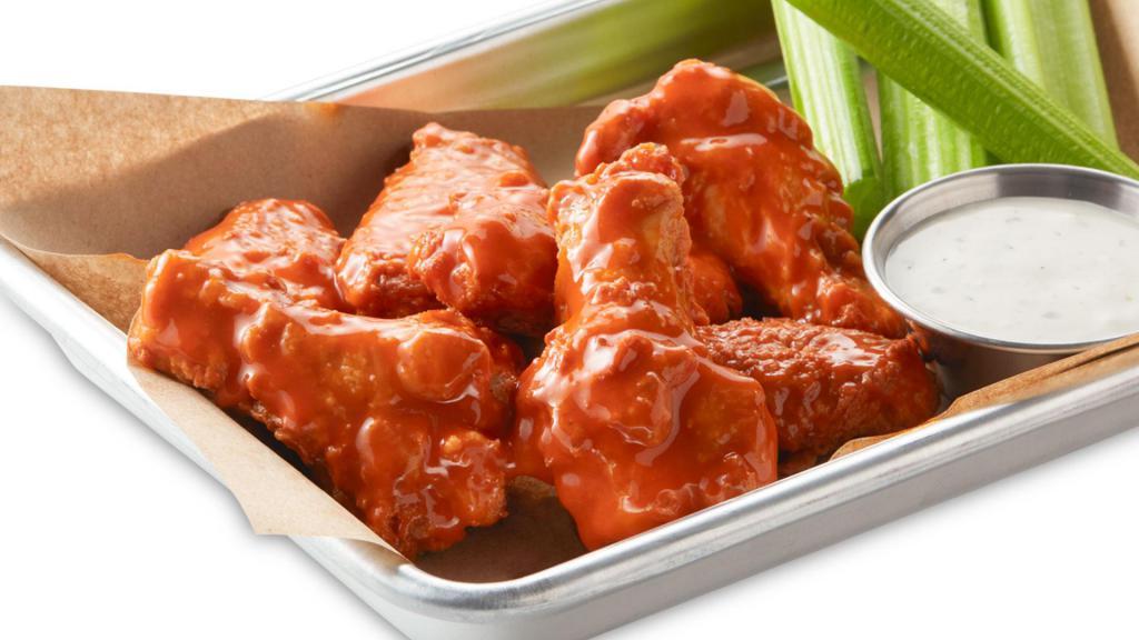 Medium Bone-in Wings · Served with side of celery and ranch or blue cheese dressing. Serves approximately 4. (215-390 cal/serv)