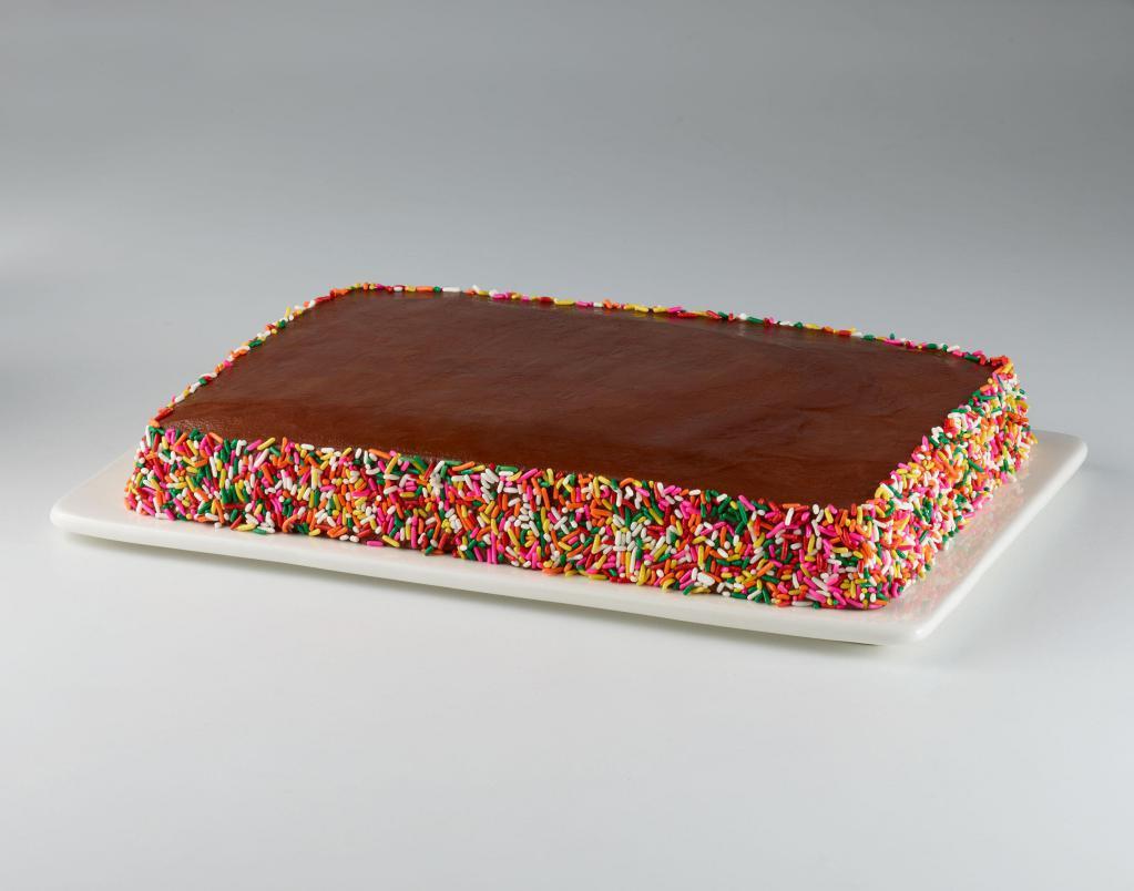 Sheet Cake · Our delicious 1/4 sheet chocolate or vanilla cake and icing with colorful sprinkles border.