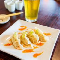 Gyoza  · Fried or steamed. Japanese style fried or steamed pork dumplings served with a tangy sweet c...