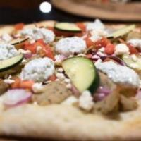 Beef and Lamb Gyro Pizza · White pizza sauce, marinated lamb beef gyro meat, tomatoes, cucumbers, feta cheese & drizzle...