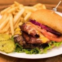 Turkey Bacon Meal · 6 oz. Angus ground chuck burger topped with thick cut turkey bacon, cheddar cheese served wi...