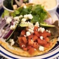 Classic Chicken Gyro Meal · Served with Greek salad and a side of hummus.