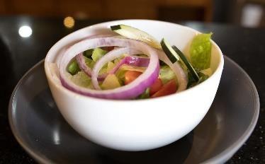 Tossed Salad · Salad that has been tossed with dressing.