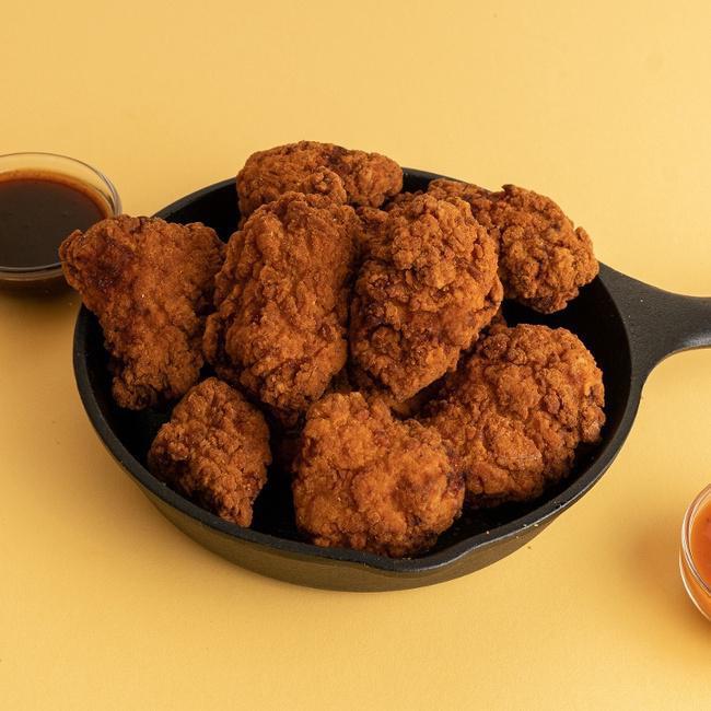Mango Habañero Boneless Wings · Hand breaded and battered, this delectable sauce is sweet with a habanero spiced kick for that perfect balance.