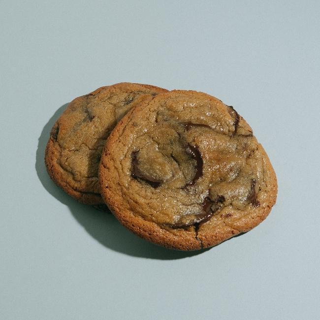 Chocolate Chip · This is a special cookie. It starts with giant fair-trade chocolate coins melted into a beautifully buttery cookie dough with just a hint of sea salt. This cookie reminds you why we love the classics